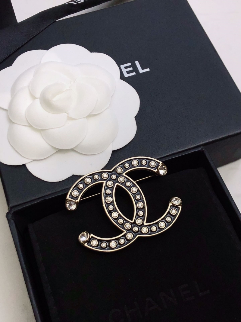 Ch**el brooches